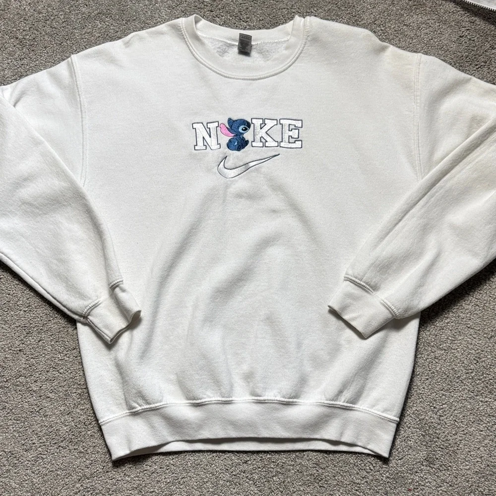 Stitch White Crewneck Sweatshirt with Blue and Pink Embroidered Nike Logo